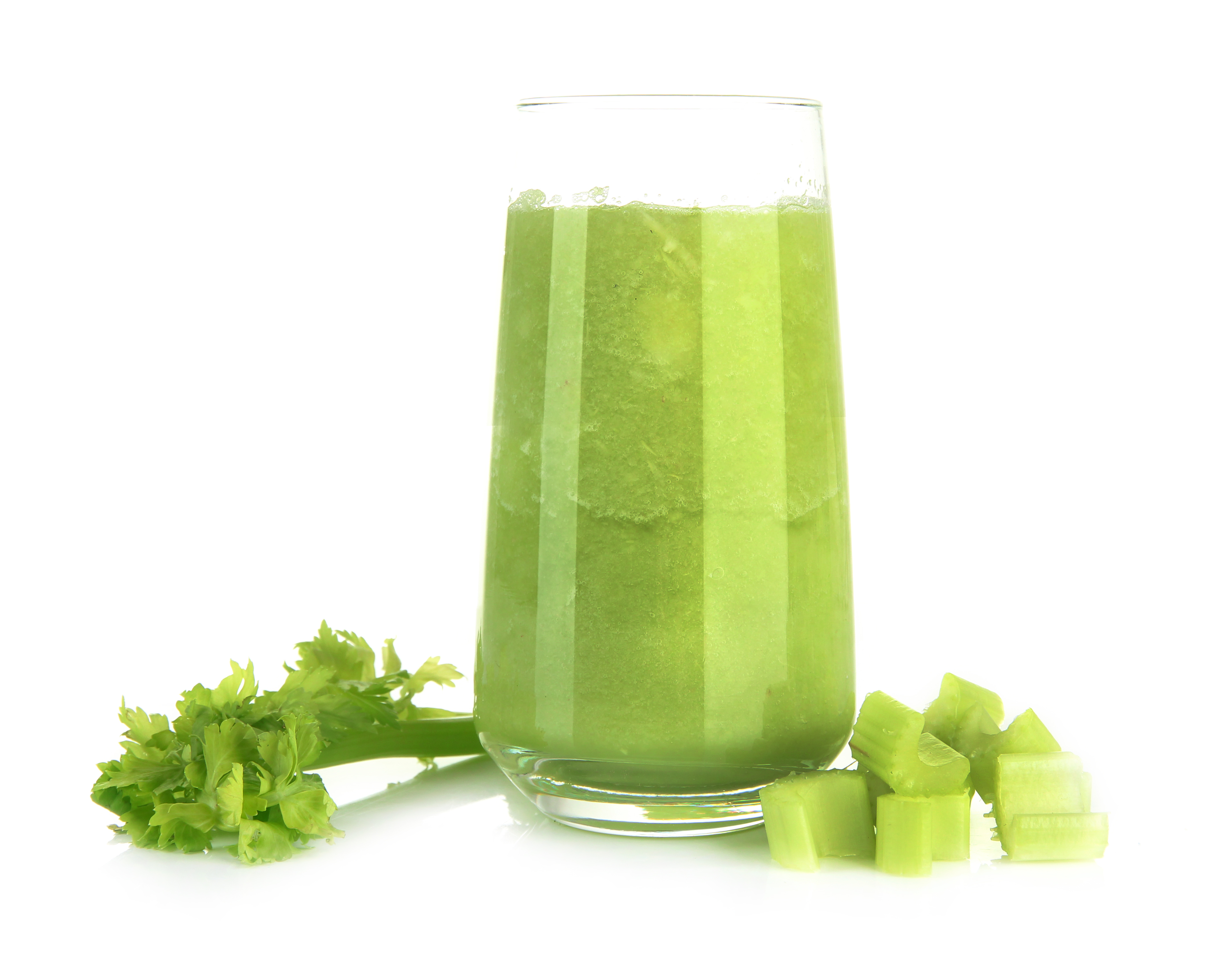 glass of bright green celery juice
